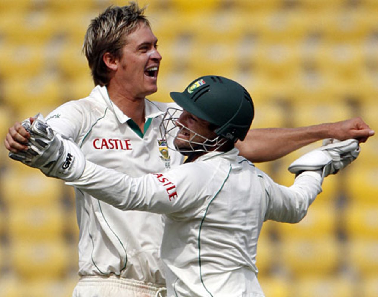Paul Harris and Mark Boucher celebrate MS Dhoni's dismissal, India v South Africa, 1st Test, Nagpur, 4th day, February 9, 2010