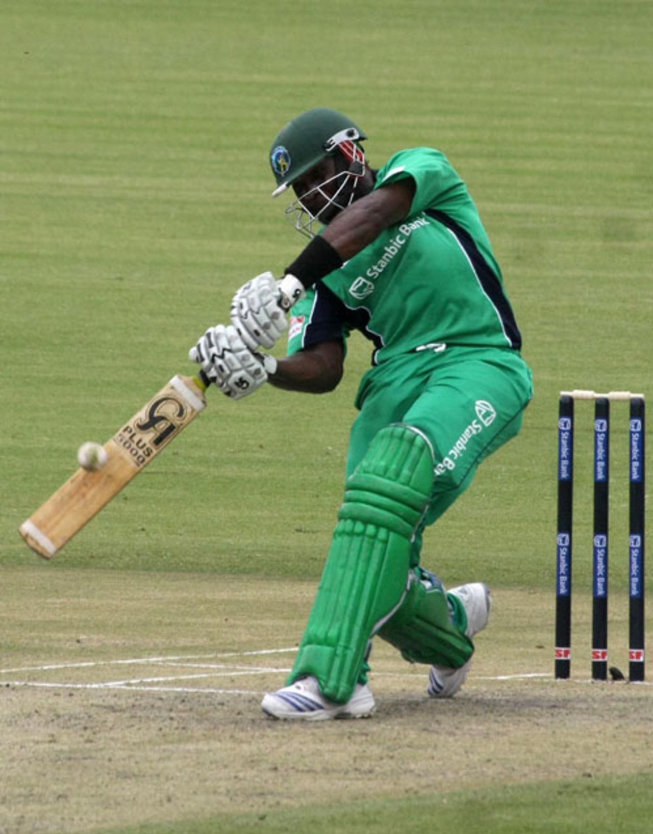 Hamilton Masakadza smashes a boundary during his match-winning innings for the Mountaineers, Mid West Rhinos v Mountaineers, Stanbic Bank T20, February 12, 2010