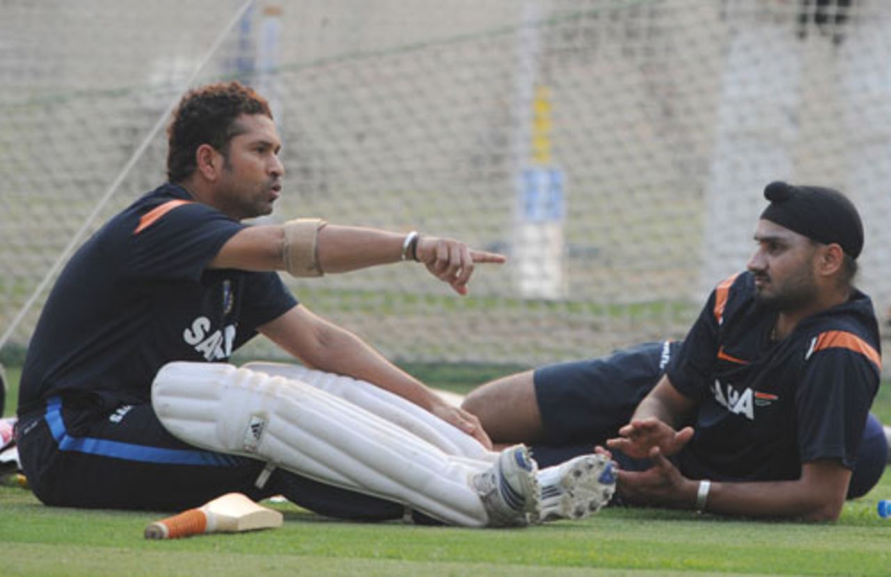 Sachin Tendulkar and a relaxed Harbhajan Singh have a discussion during a practice session, Kolkata, February 12, 2010