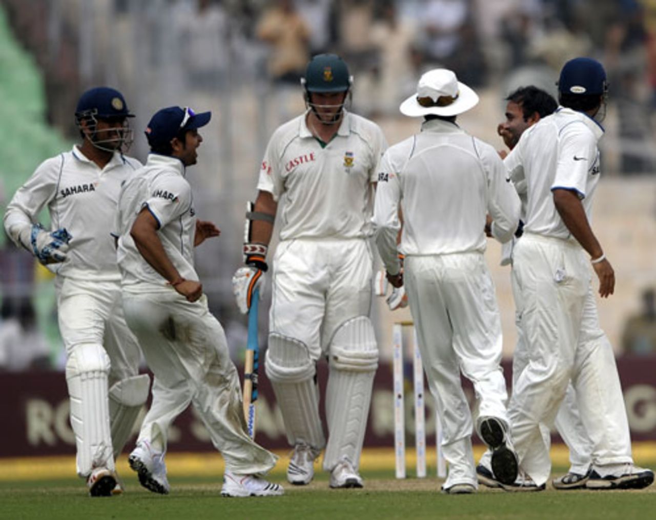 India's fielders celebrate as Graeme Smith walks back to the pavilion, India v South Africa, 2nd Test, Kolkata, 4th day, February 17, 2010