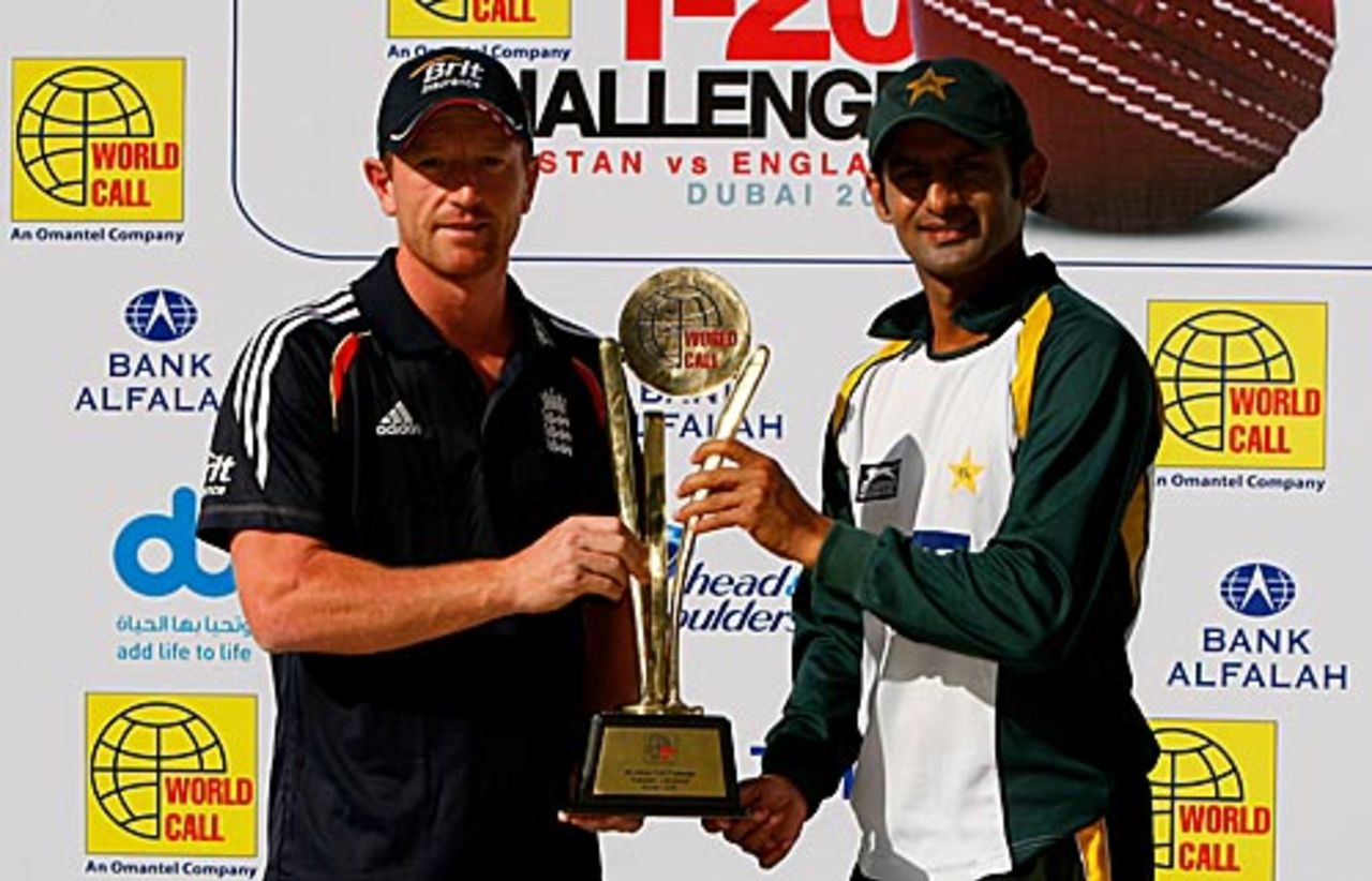 Captains Paul Collingwood and Shoaib Malik pose with the series trophy on the eve of the first Twenty20 international, Dubai, February 18, 2010