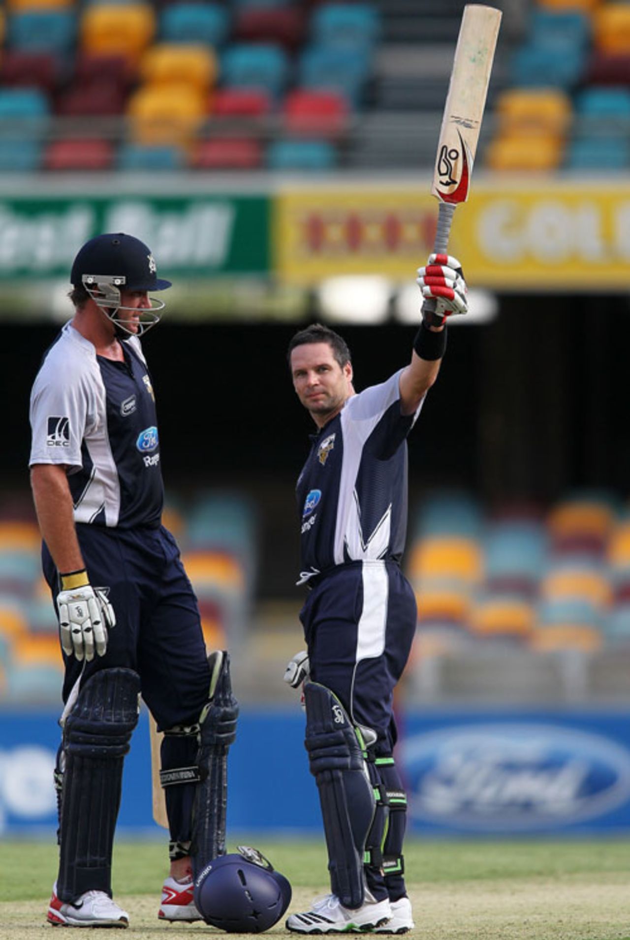 Brad Hodge raises his century on the way to an unbeaten 136, Queensland v Victoria, FR Cup, Brisbane, 20 February, 2010