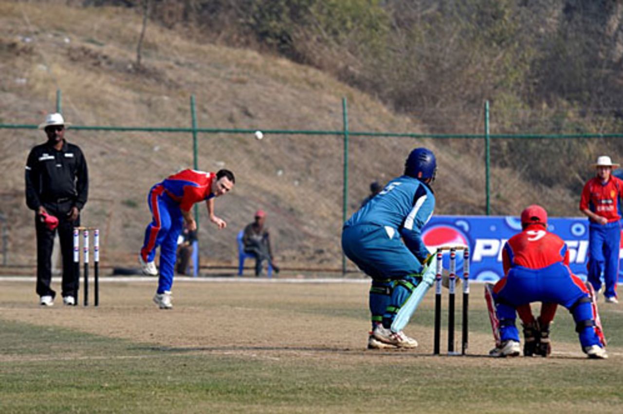 Matt Hague bends his back, Jersey v Fiji, ICC World Cricket League Division Five, Kirtipur, February 21, 2010