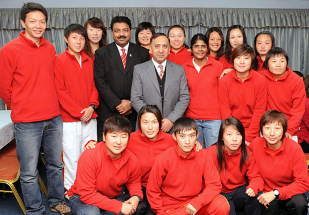 HKCA President Capt. Saleem and Mr Alex Ilyas pose with the China Women's Cricket Team at a dinner function held at the Pakistan Association