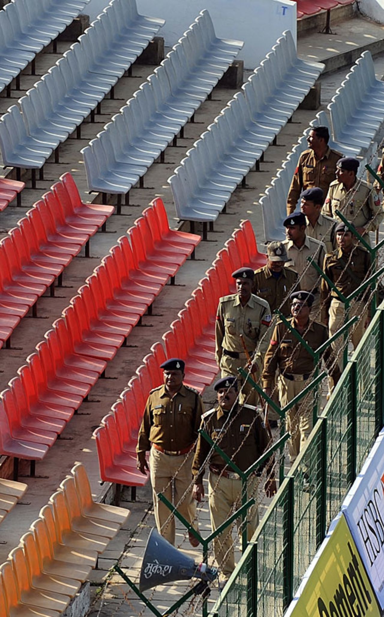 Security guards do a round of the Captain Roop Singh Stadium, Gwalior, February 22, 2010