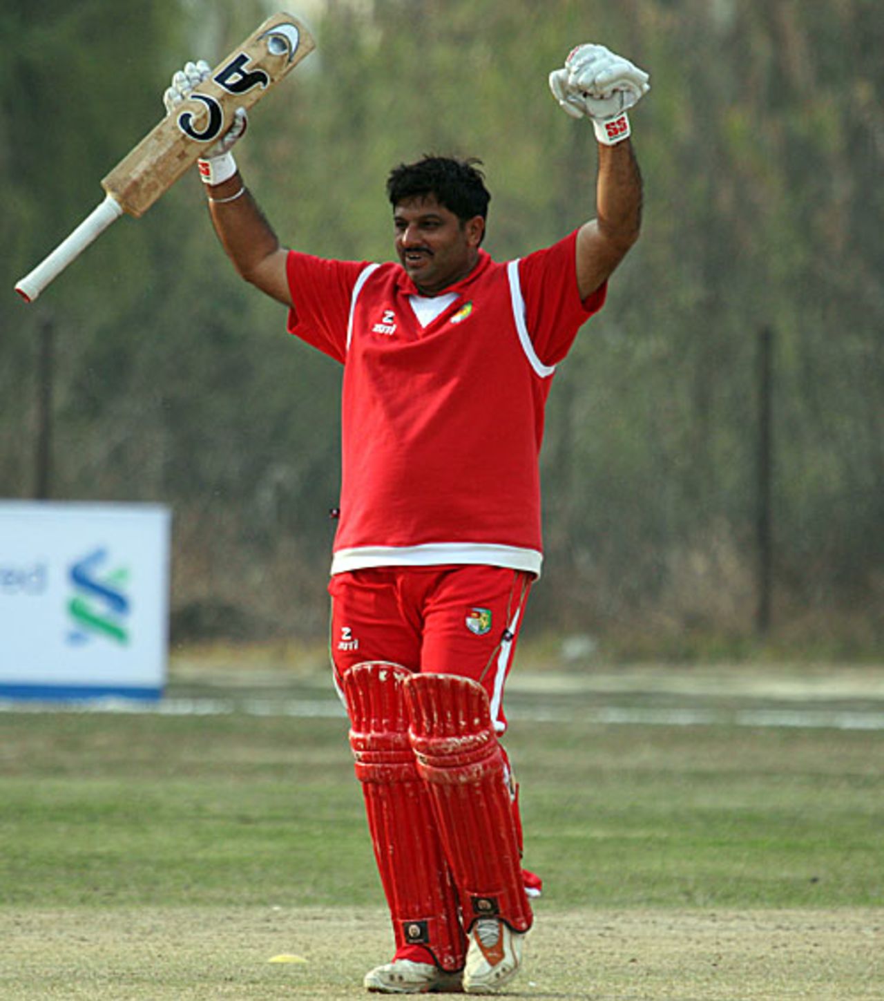 Monish Arora punches the air after guiding Singapore to victory, Fiji v Singapore, ICC World Cricket League Division Five, Lalitpur, February 23, 2010