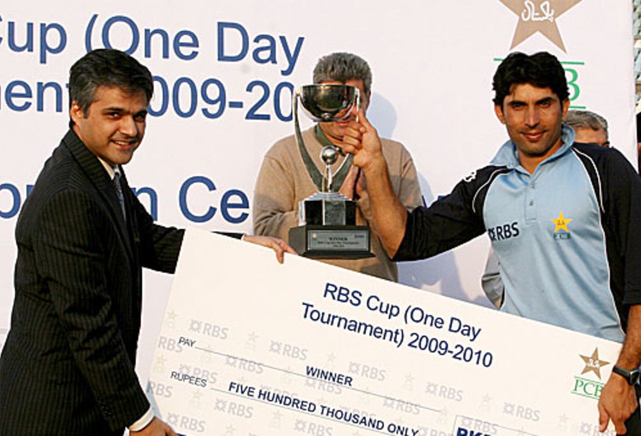 Misbah-ul-Haq receives the winners' trophy for SNGPL, Sui Northern Gas Pipelines Limited v Sialkot Stallions, Royal Bank of Scotland Cup, final, Lahore, February 23, 2010 
