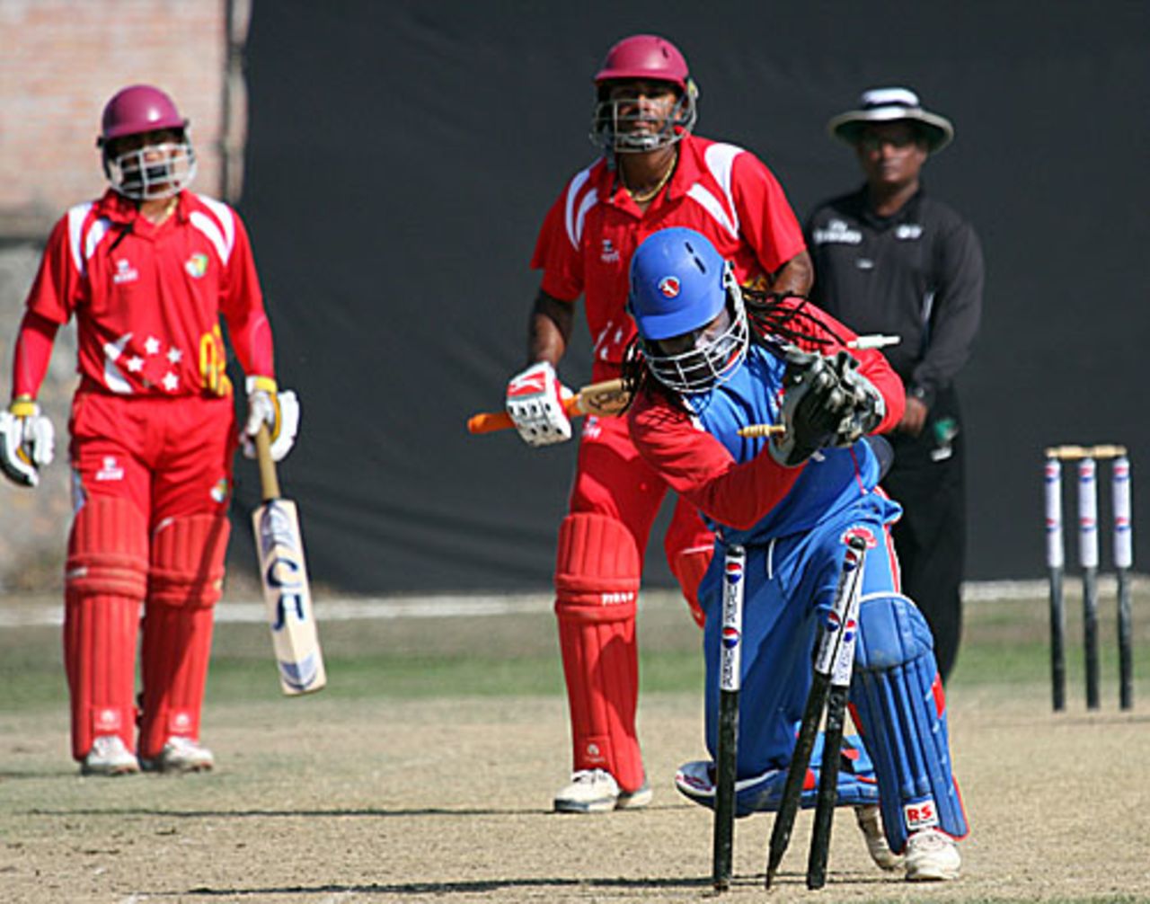 Buddika Mendis is run out by a fair distance, Singapore v USA, ICC World Cricket League Division Five, Lalitpur, February 24, 2010