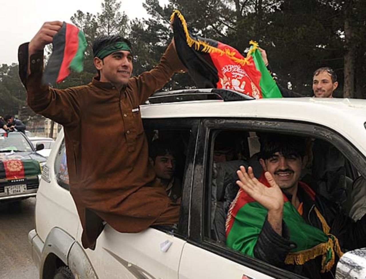 Afghanistan fans celebrate their team's arrival, Kabul, February 25, 2010