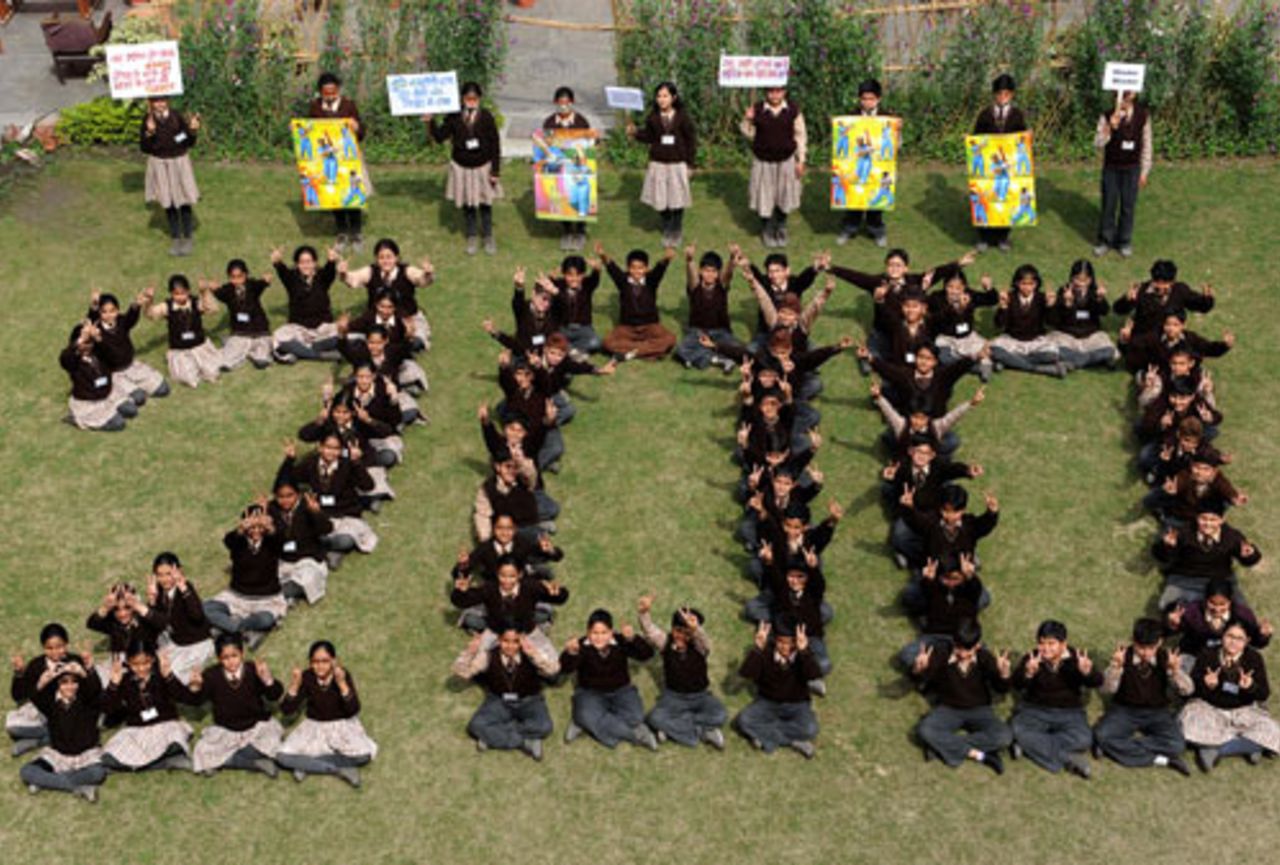 Indian schoolkids form the number 200 in tribute to Sachin Tendulkar's double century, Amritsar, February 25, 2010