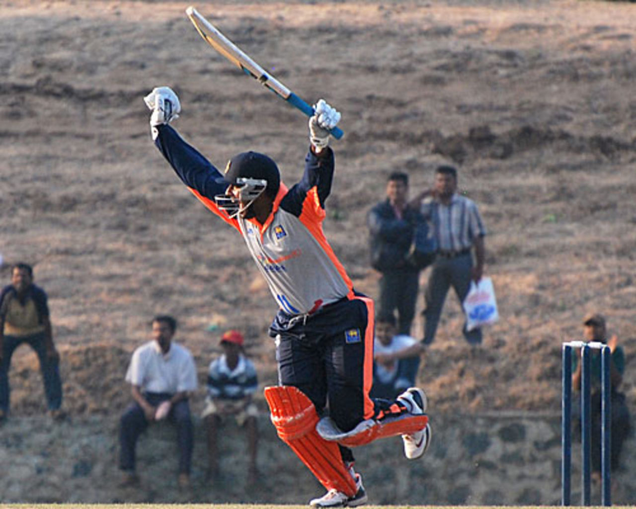 Prasanna Jayawardene exults after striking a last-ball four to win the match, Kandurata v Basnahira South, SLC Inter-Provincial Twenty20 Tournament Pallekele, February 25, 2010