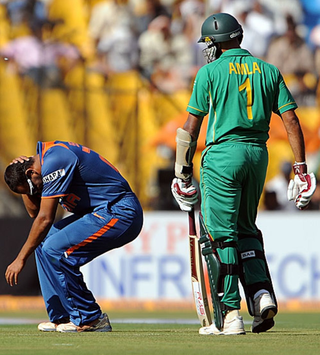 Yusuf Pathan is in pain after a collision with Hashim Amla, India v South Africa, 3rd ODI, Ahmedabad, February 27, 2010