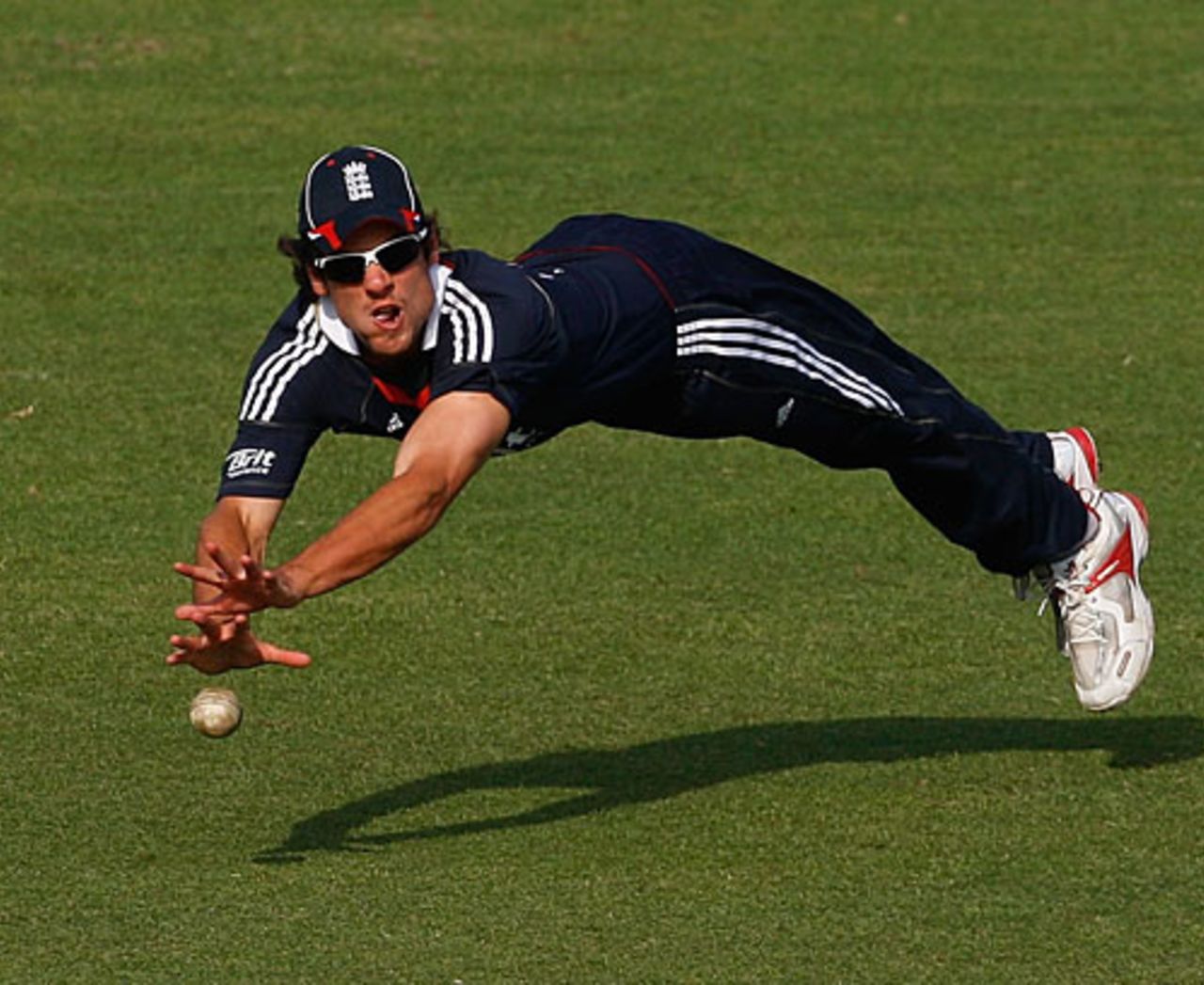 Alastair Cook couldn't quite reach a chance from James Tredwell's first over that landed just short2nd ODI, Dhaka, March 2, 2010
