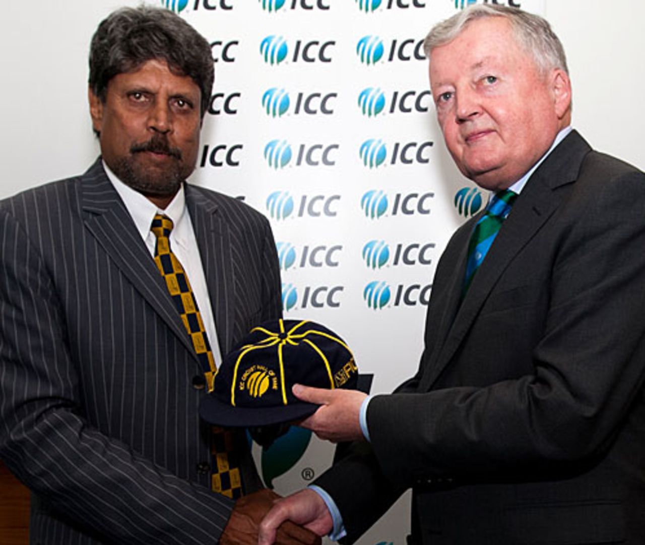 Kapil Dev gets a commemorative cap from David Morgan after being inducted into the ICC Hall of Fame, Dubai, March 9, 2010