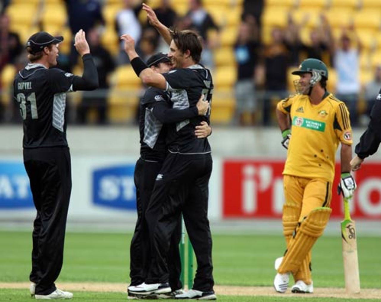 Shane Bond celebrates and Ricky Ponting can't believe it after being given out caught off his helmet, New Zealand v Australia, 5th ODI, Wellington, March 13, 2010