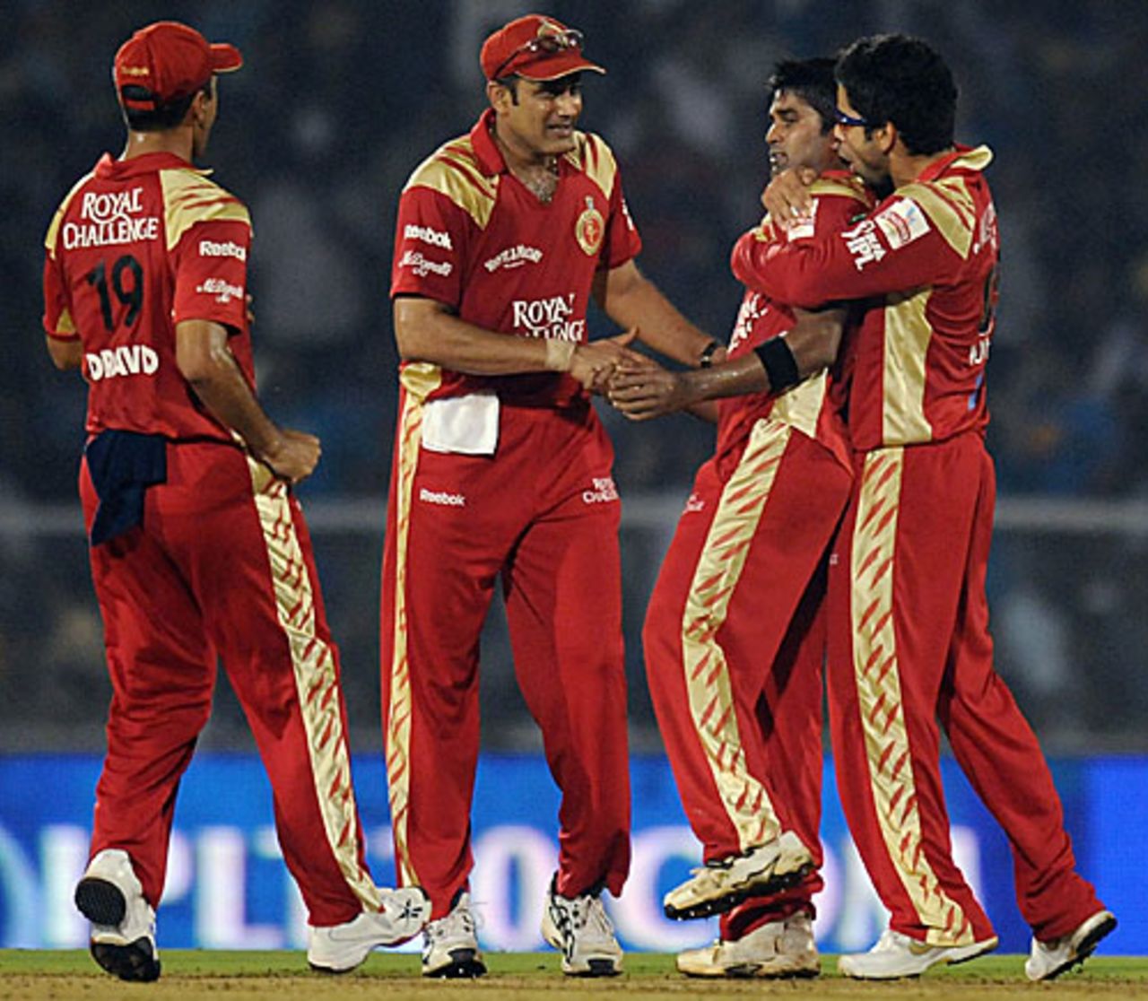 Vinay Kumar is the center of attention after taking three wickets in an over, Mumbai Indians v Royal Challengers Bangalore, IPL, Mumbai, March 20, 2010