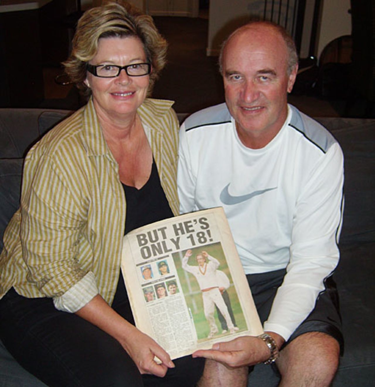 Robyn and Renzo Vettori with the newspaper announcing their son Daniel's Test debut, 1997