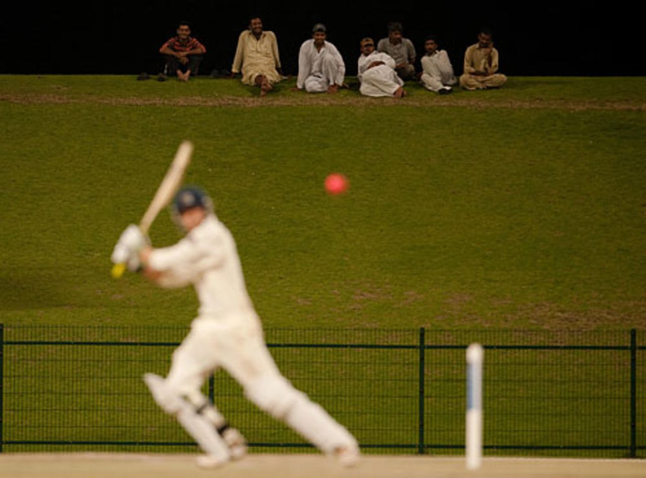 A smattering of fans watch on as Dawid Malan tries to counter-attack, MCC v Durham, Abu Dhabi, March 30, 2010
