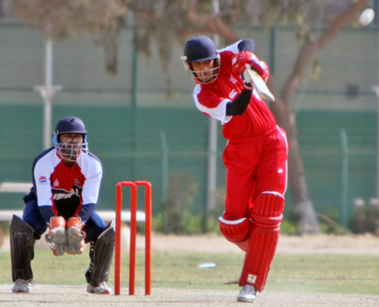 Waqas Barkat lofts one down the ground against Nepal at the ACC Trophy Elite 2010 being played in Kuwait