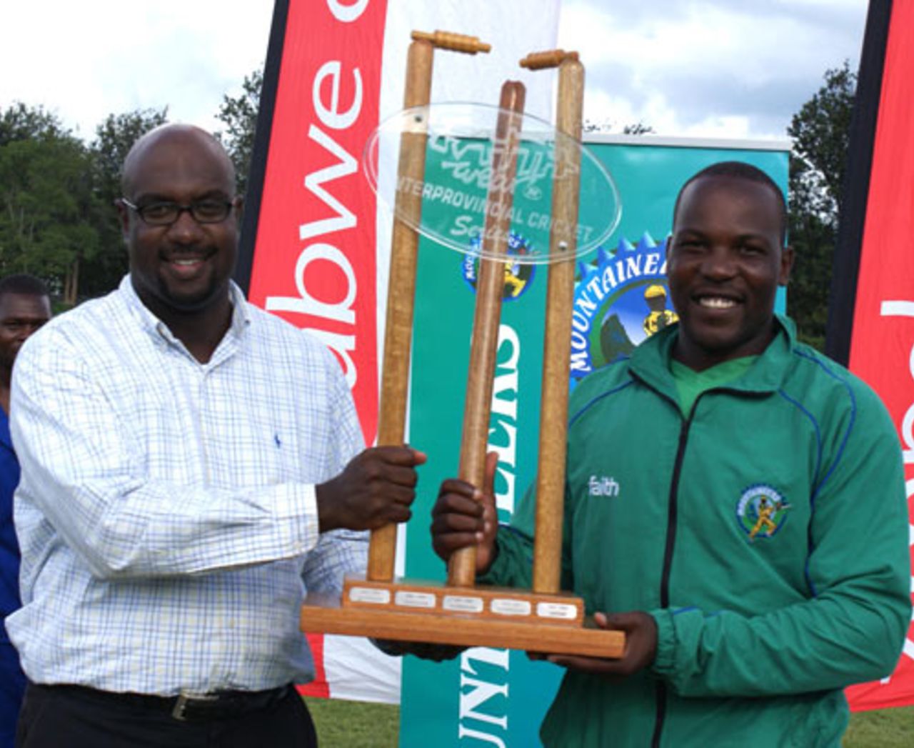 Ozias Bvute, Zimbabwe Cricket's managing director, hands the trophy to Hamilton Masakadza, Mountaineers v Mid West Rhinos, Faithwear Cup final, Mutare, April 10, 2010