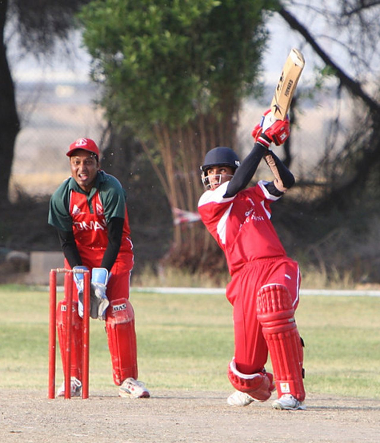 Waqas Barkat smashes a full toss for four against Oman at the ACC Trophy Elite 2010 played in Kuwait