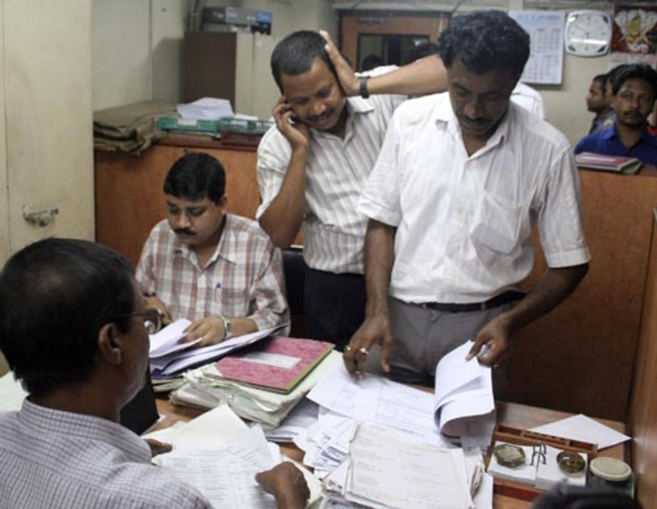 Income tax officials at the Cricket Association of Bengal office, Kolkata, April 21, 2010