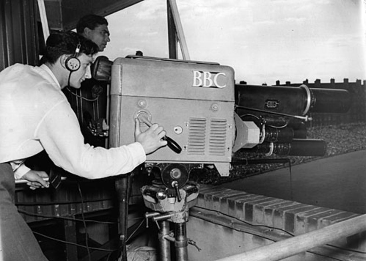 A BBC television cameraman at work at The Oval, 1955