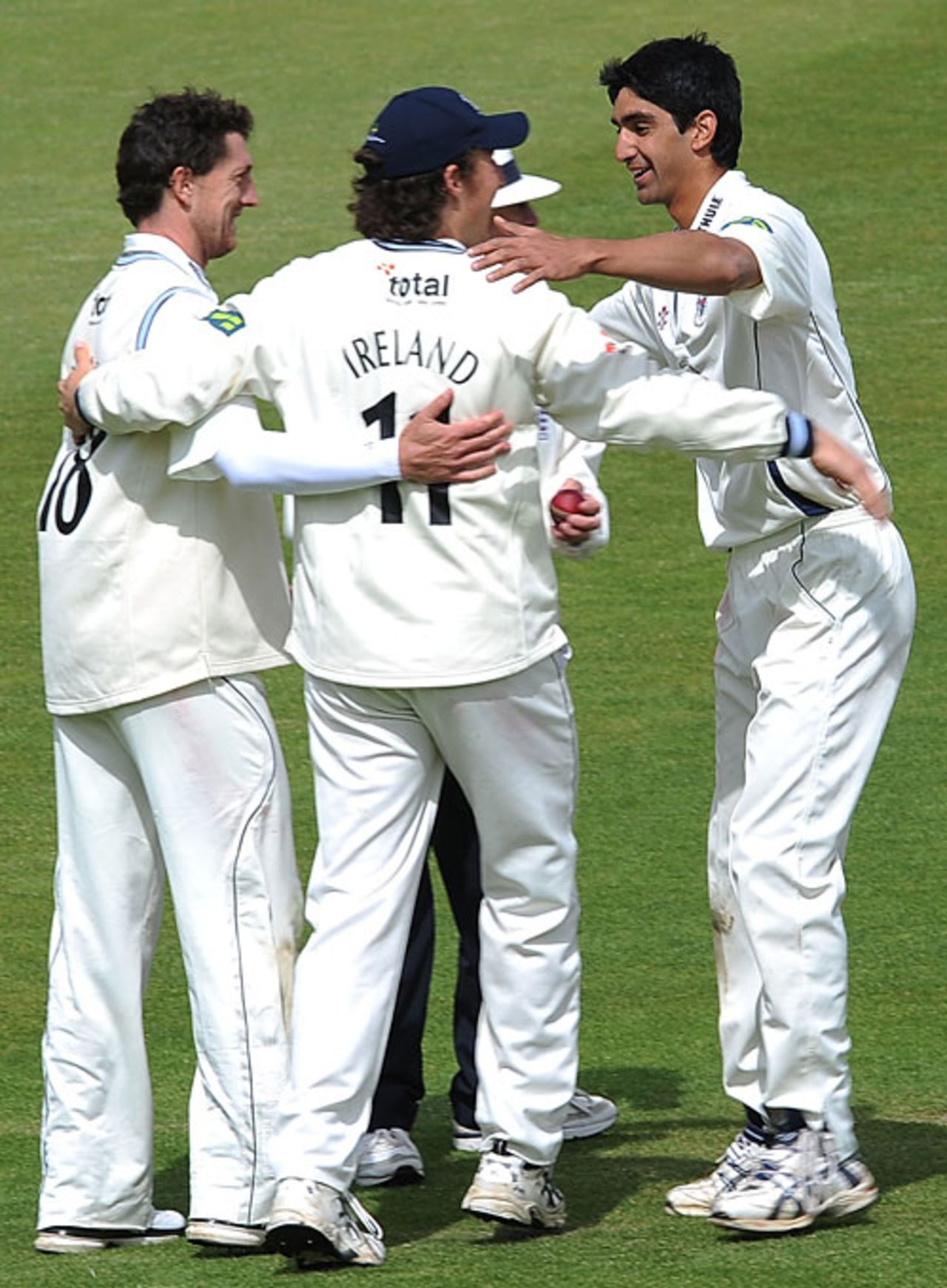 Gemaal Hussain is congratulated by his Gloucestershire team-mates as his five wickets helped them to victory, Middlesex v Gloucestershire, County Championship, Division Two, Lord's, April 30, 2010