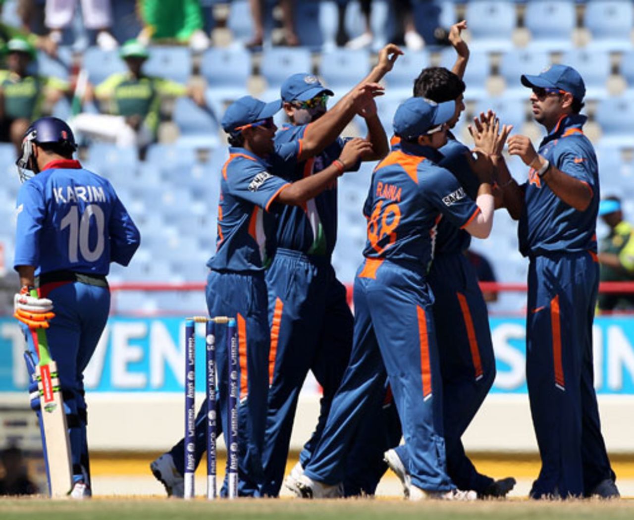 The Indian fielders celebrate the dismissal of Karim Sadiq, Afghanistan v India, World Twenty20, Gros Islet, May 1, 2010