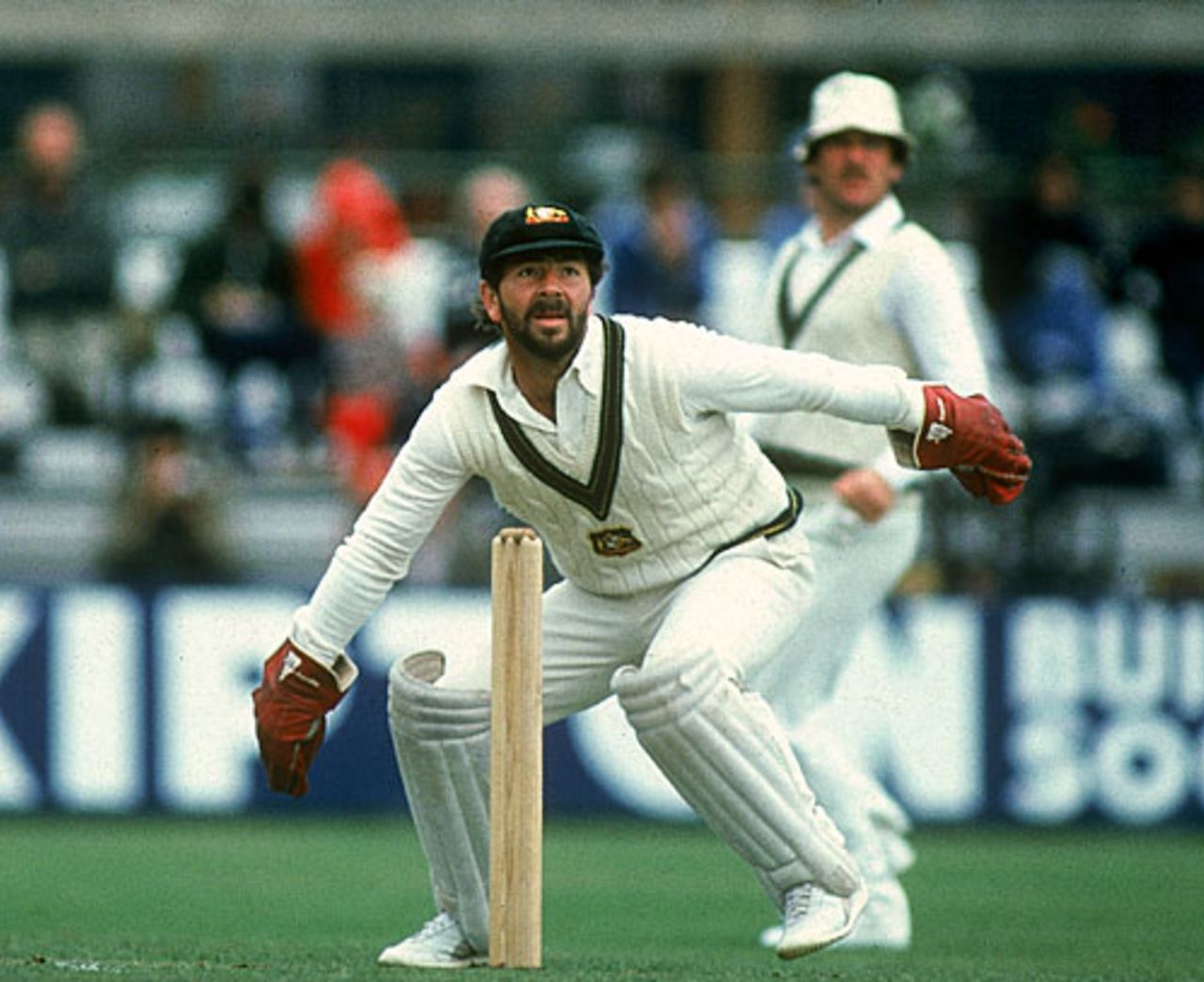 Rod Marsh waits for a return catch