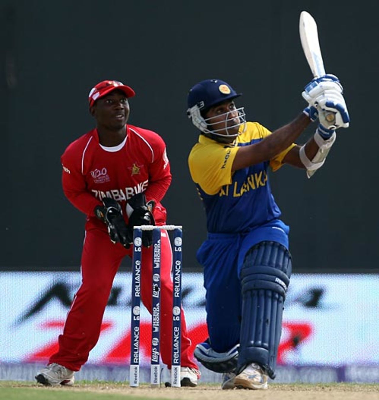 Mahela Jayawardene lofts over the leg side, Sri Lanka v Zimbabwe, ICC World Twenty20, Guyana, May 3, 2010