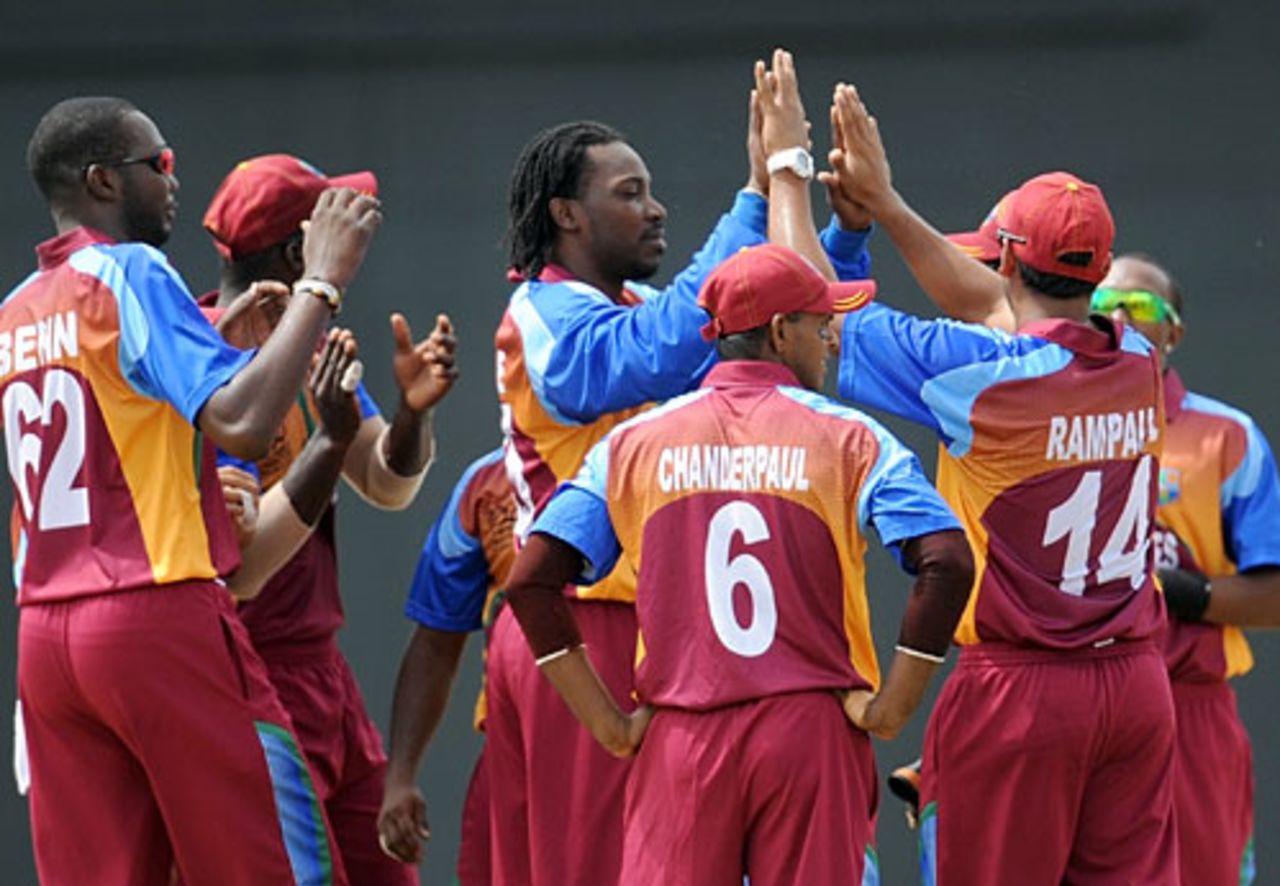 Chris Gayle is congratulated by his team-mates after removing Michael Lumb, West Indies v England, ICC World Twenty20, Guyana, May 3, 2010
