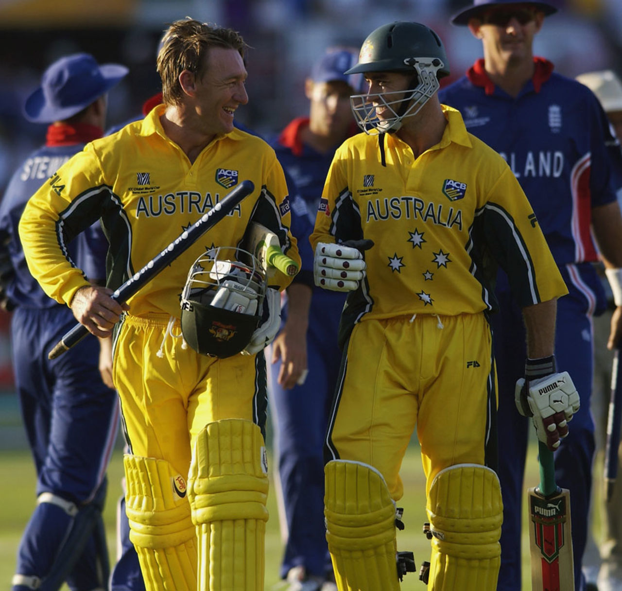 PORT ELIZABETH - MARCH 2: Michael Bevan(R) and Andy Bichel of Australia walks off at the end of the ICC Cricket World Cup 2003, Pool A match between Australia and England at St George's Park, Port Elizabeth, South Africa on March 2, 2003.