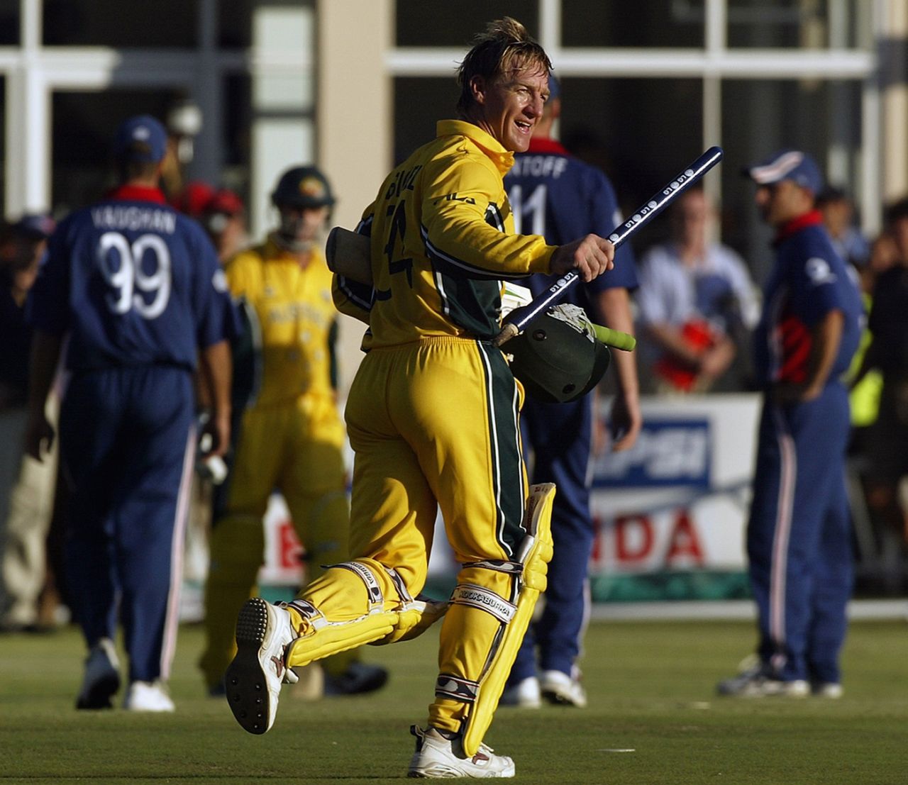Andy Bichel runs holding a stump after Australia's victory, Australia v England, World Cup, Port Elizabeth, March 2, 2003