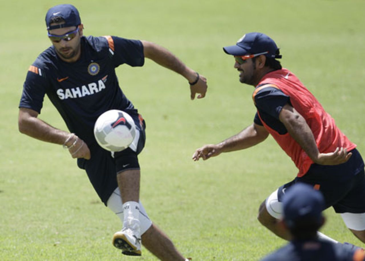 MS Dhoni and Yuvraj play some football during practice, Barbados, May 5, 2010