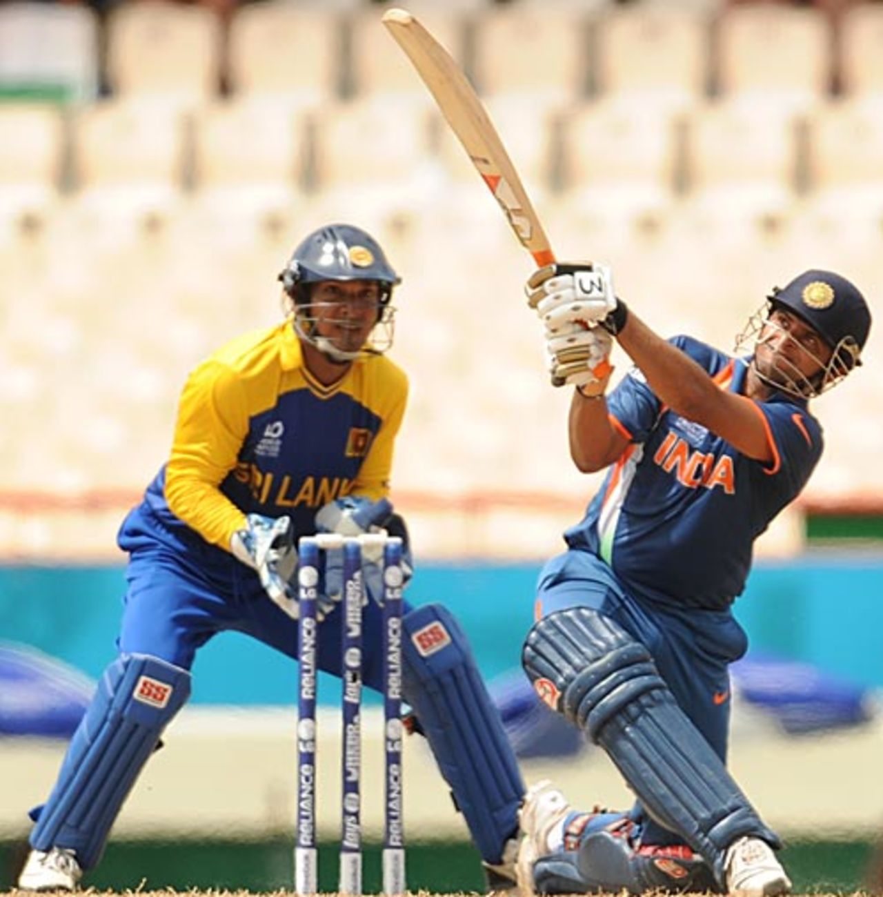 Suresh Raina plays his favoured slog-sweep, Sri Lanka v India, Group F, World Twenty20, St Lucia, May 11, 2010