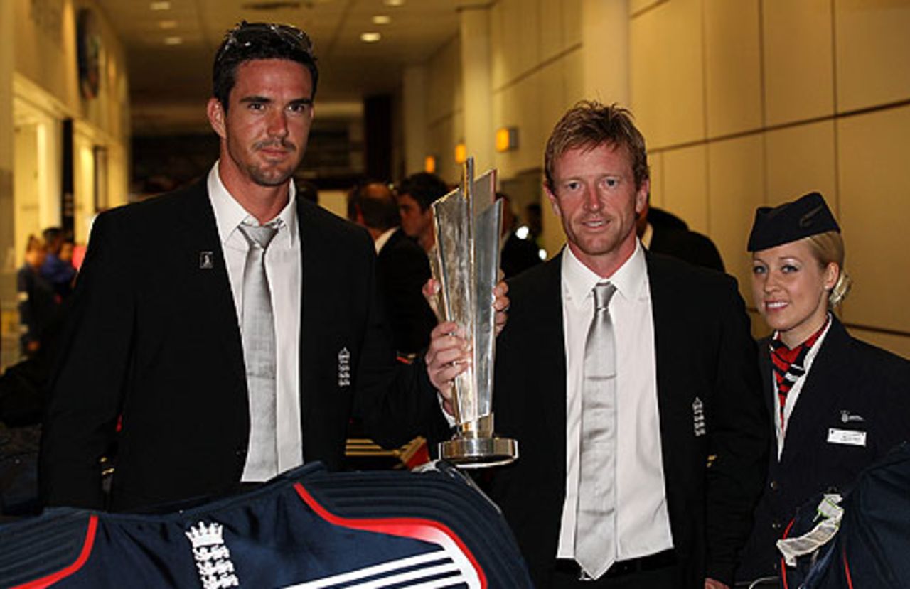 Kevin Pietersen and Paul Collingwood arrive back at Gatwick Airport with the World Twenty20 trophy in their hand luggage, London, May 18, 2010