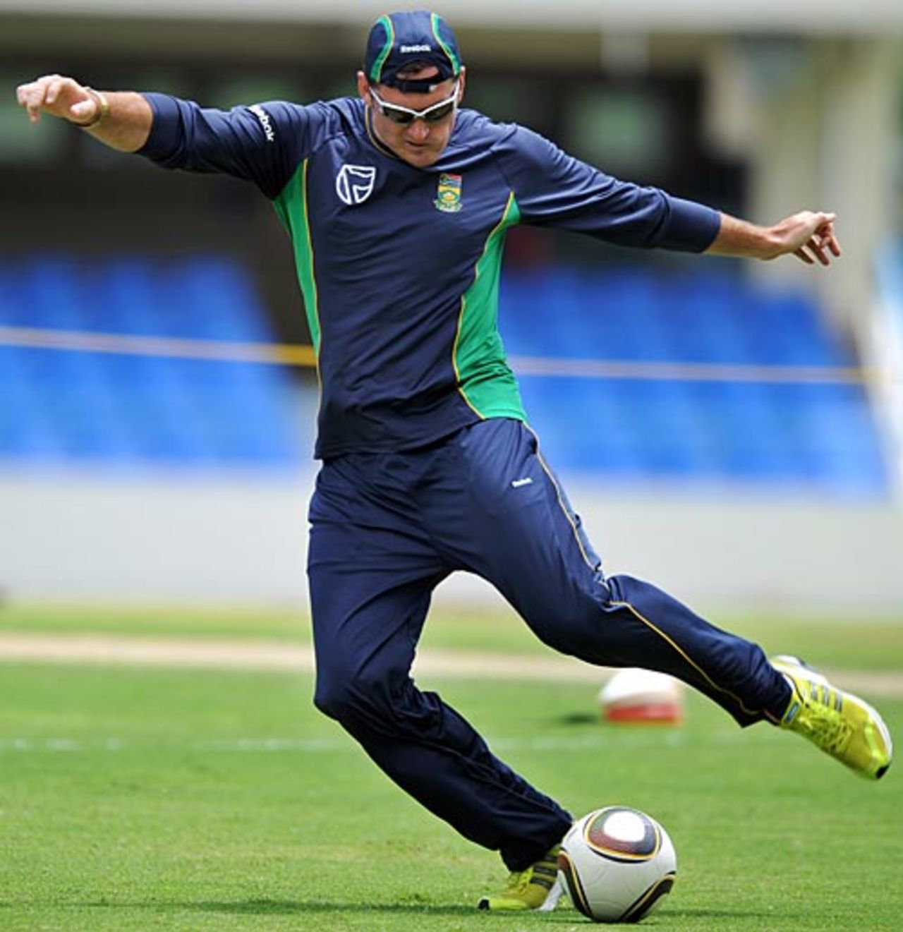 Graeme Smith kicks a football, Antigua, May 18 2010