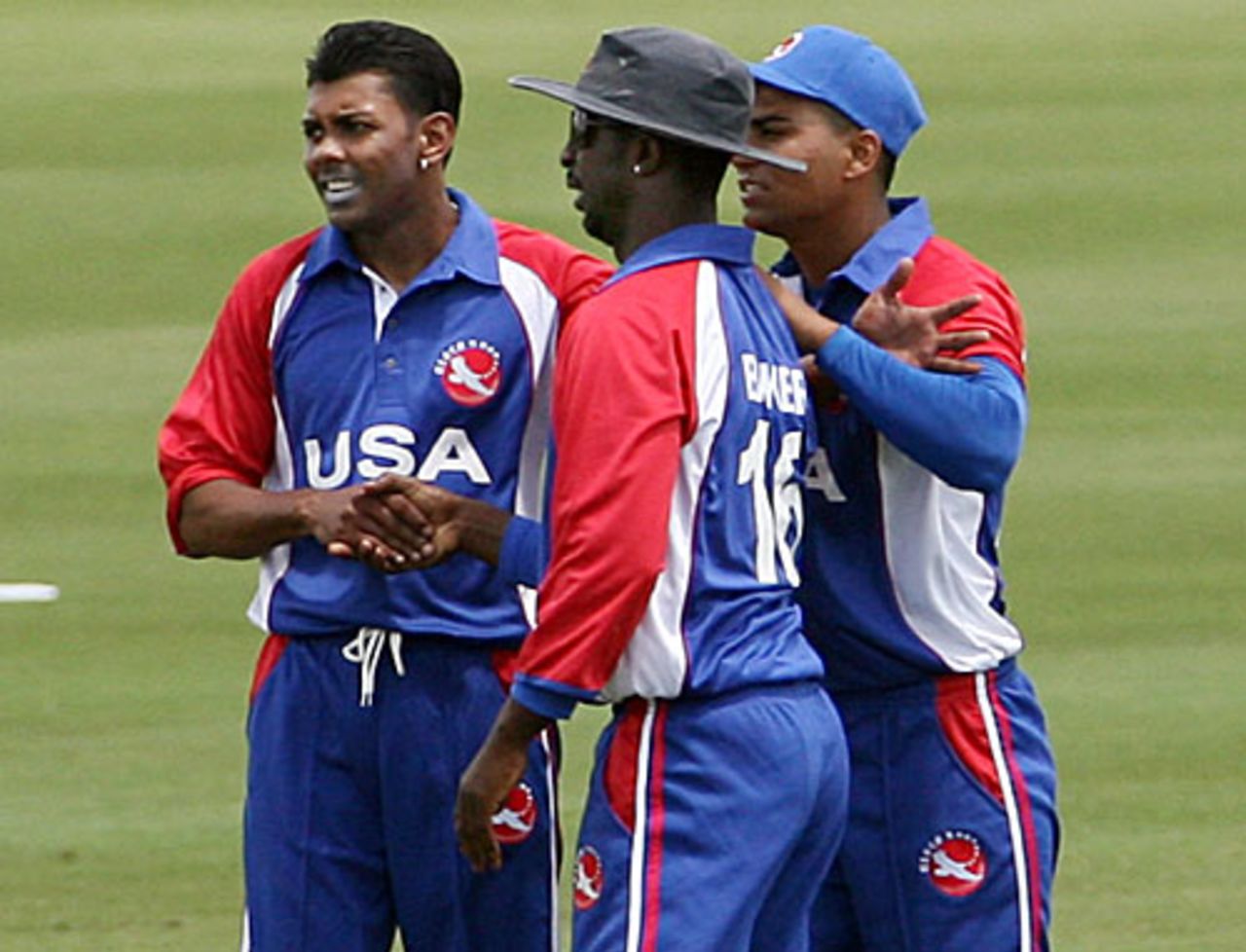 Orlando Baker is greeted by Steve Massiah and Asad Ghous after taking a catch, United States of America v Jamaica, 1st match, Lauderhill, May 21, 2010 