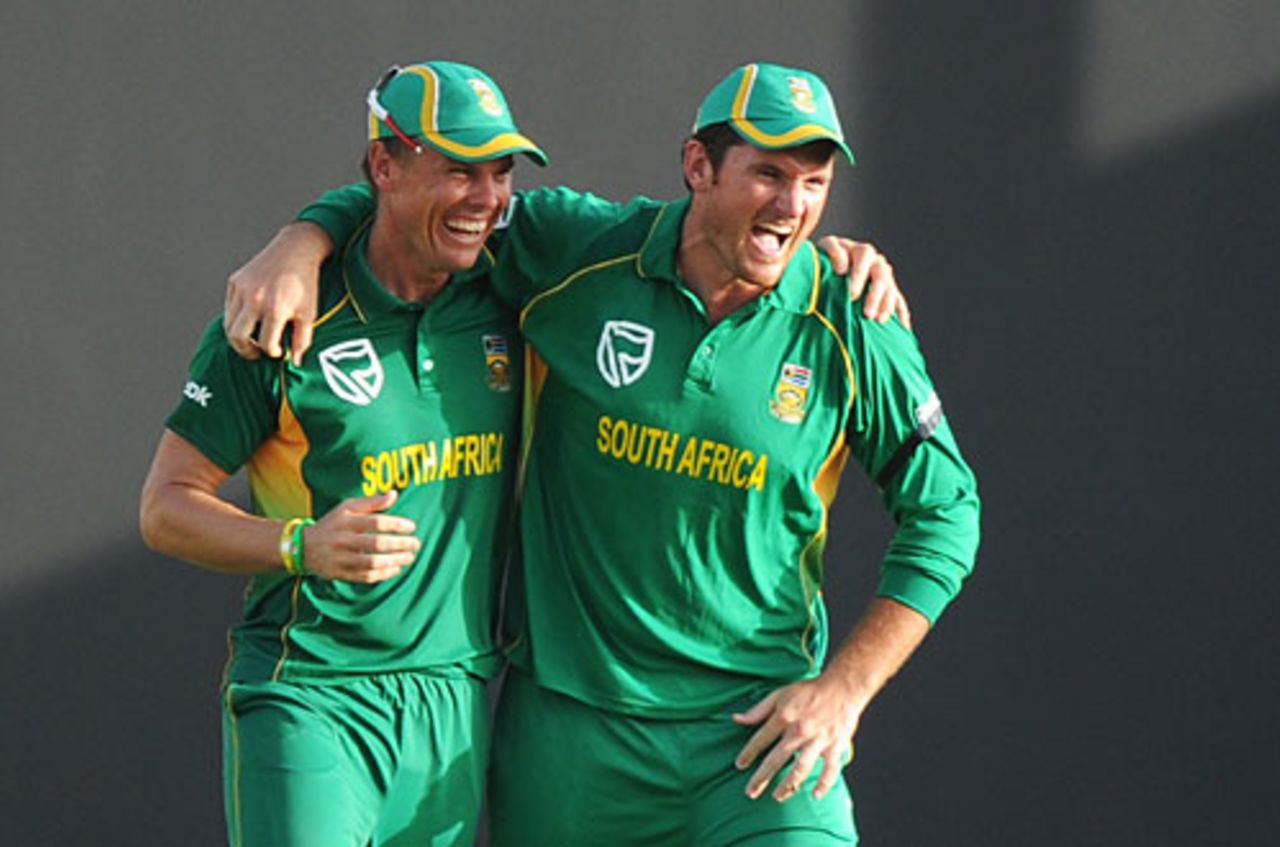 Graeme Smith celebrates with Johan Botha after sealing South Africa a tense win by running out Nikita Miller, West Indies v South Africa, 2nd ODI, Antigua, May 24, 2010