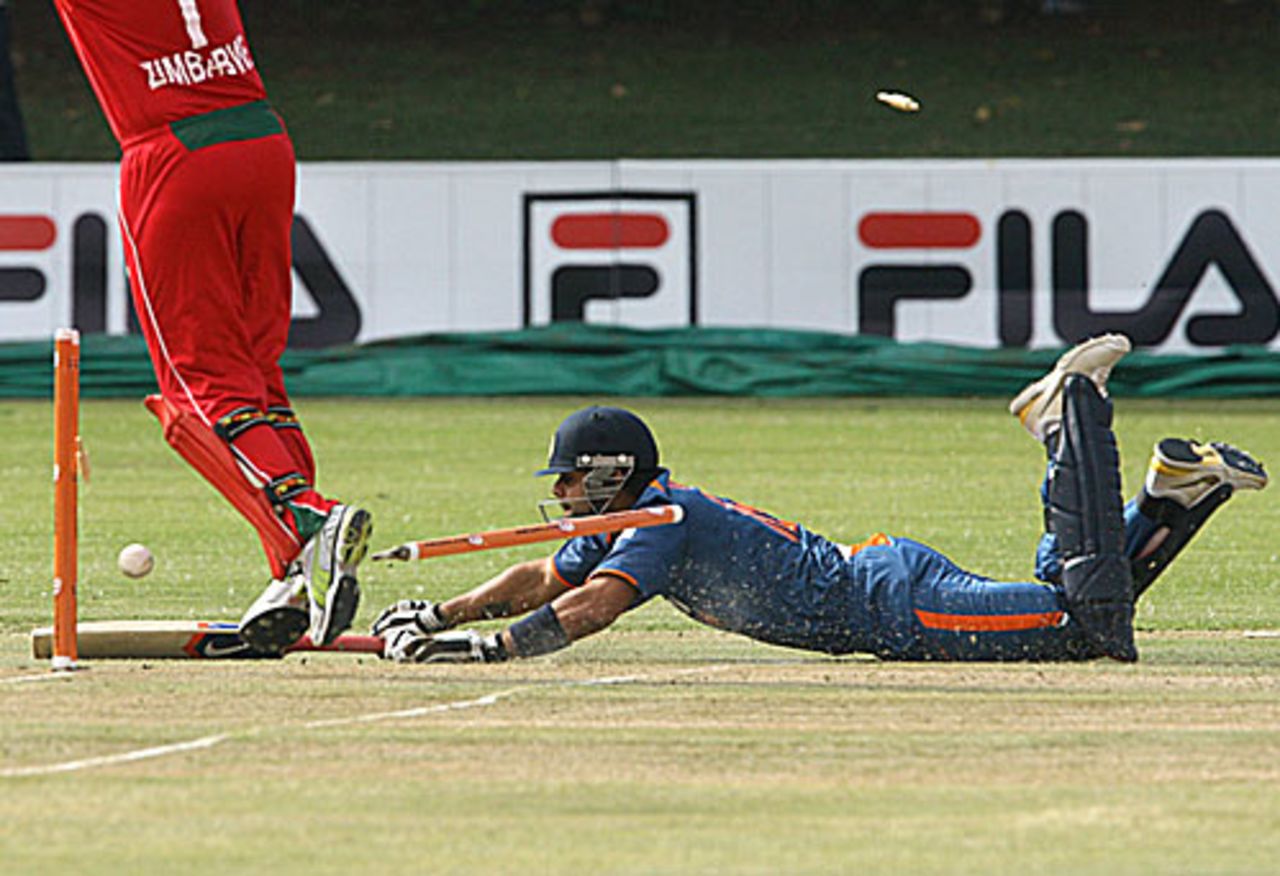 Virat Kohli puts in the dive, but is caught short of the crease, Zimbabwe v India, Tri-series, 1st ODI, Bulawayo, May 28, 2010