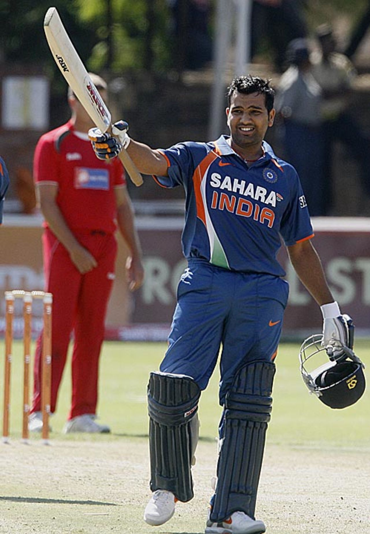 Rohit Sharma celebrates his maiden ODI century, Zimbabwe v India, Tri-series, 1st ODI, Bulawayo, May 28, 2010