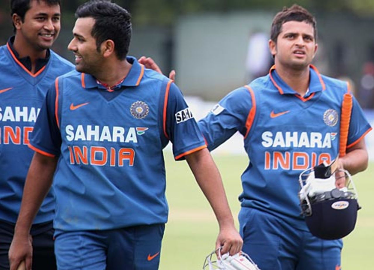 Rohit Sharma and Suresh Raina walk off the field, India v Sri Lanka, Tri-series, 2nd ODI, Bulawayo, May 30, 2010