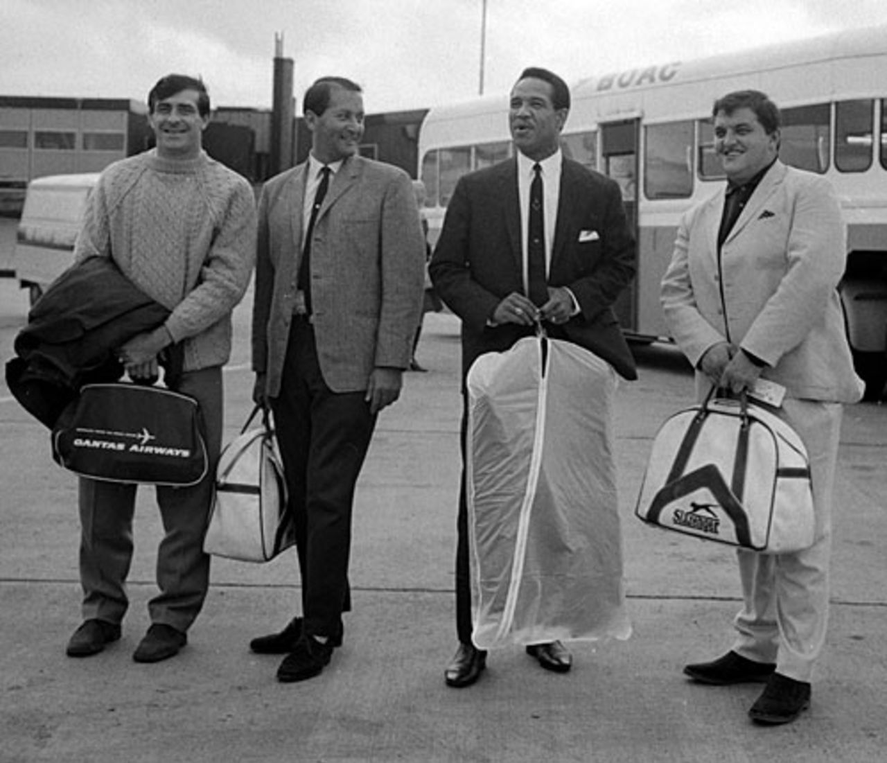 Fred Trueman, Basil D'Oliveira, Garry Sobers and Colin Milburn at Heathrow as they leave to take part in the Doubles Wicket contest in Australia, London, September 27, 1968