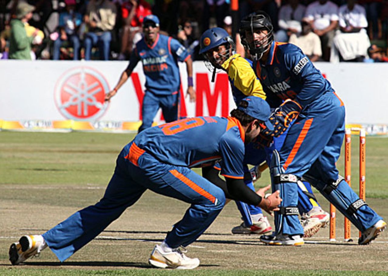 Virat Kohli takes the catch a slip to send back Upul Tharanga, Sri Lanka v India, Tri-series, 5th ODI, Harare, June 5, 2010