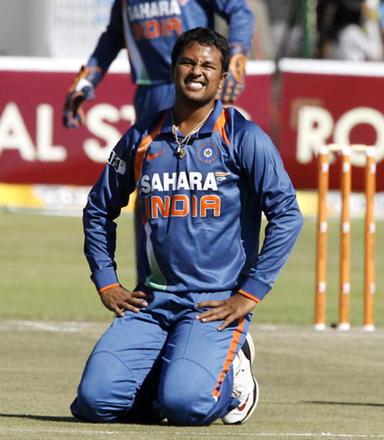 Pragyan Ojha after failing to stop a ball off his own bowling, Sri Lanka v India, Tri-series, 5th ODI, Harare, June 5, 2010