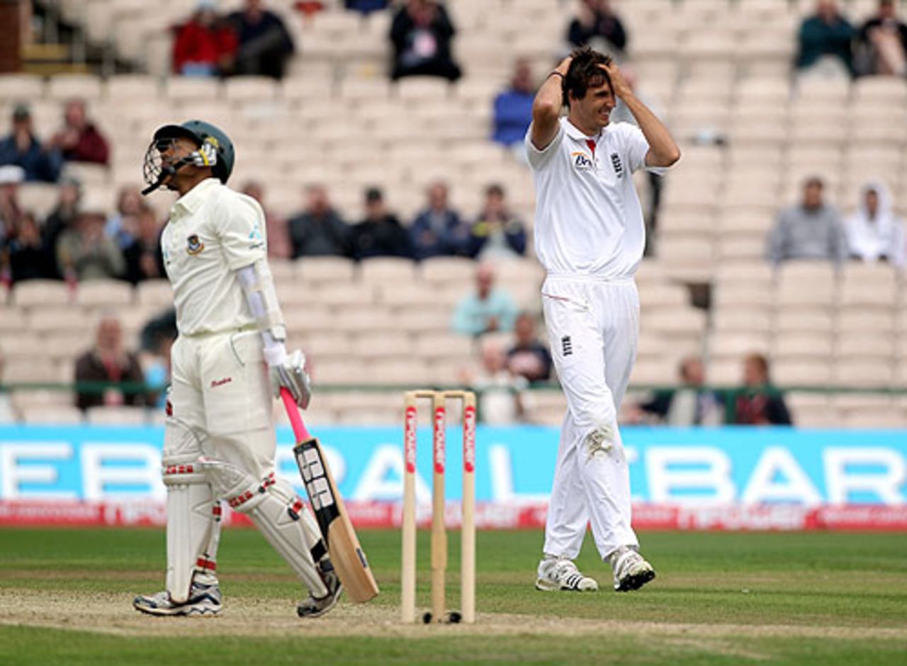Mushfiqur Rahim is aghast and Steven Finn embarrassed after a tame dismissal at midwicket, England v Bangladesh, 2nd npower Test, Old Trafford, June 6, 2010