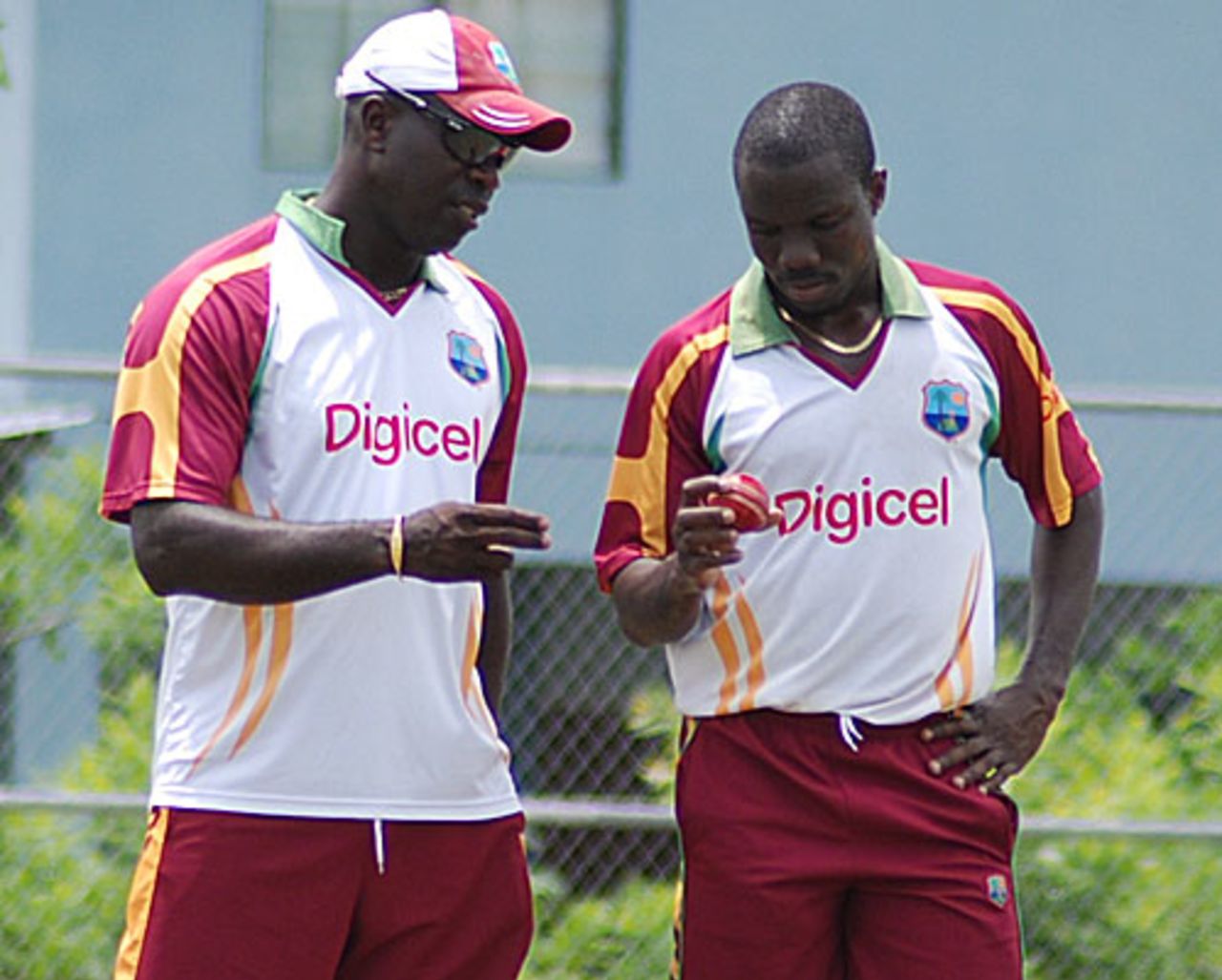 Nelon Pascal and Ottis Gibson share a word during practice, Trinidad, June 9, 2010
