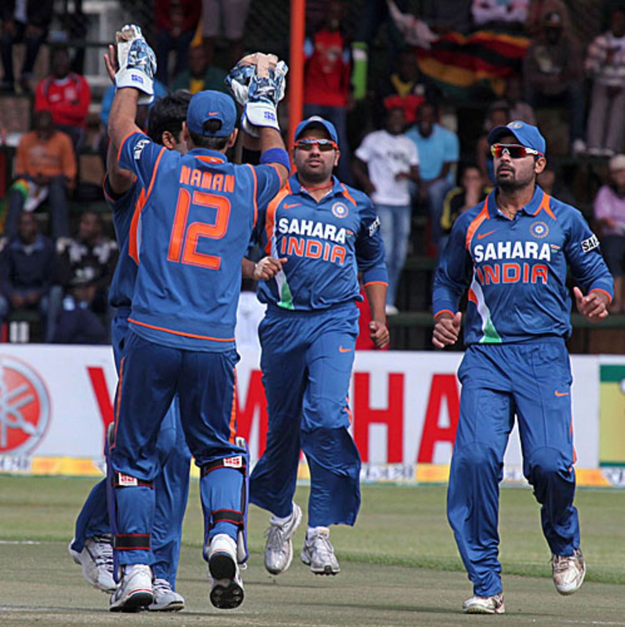 The Indians celebrate a strike, Zimbabwe v India, 1st Twenty20, Harare, June 12, 2010