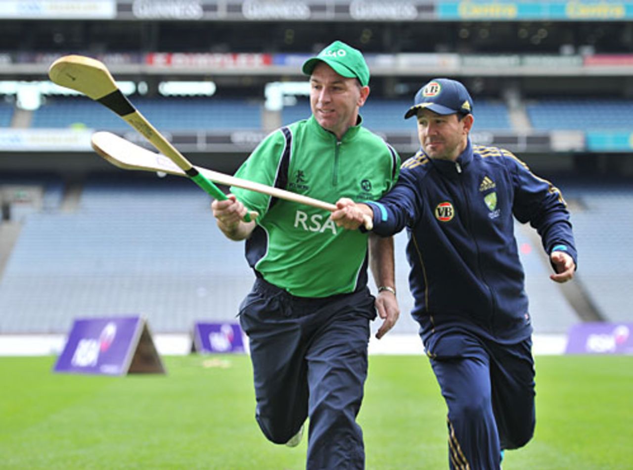 Ricky Ponting gets a lesson from DJ Carey, the Irish hurling legend, ahead of Australia's ODI against Ireland on June 17, Croke Park, Dublin, June 14, 2010